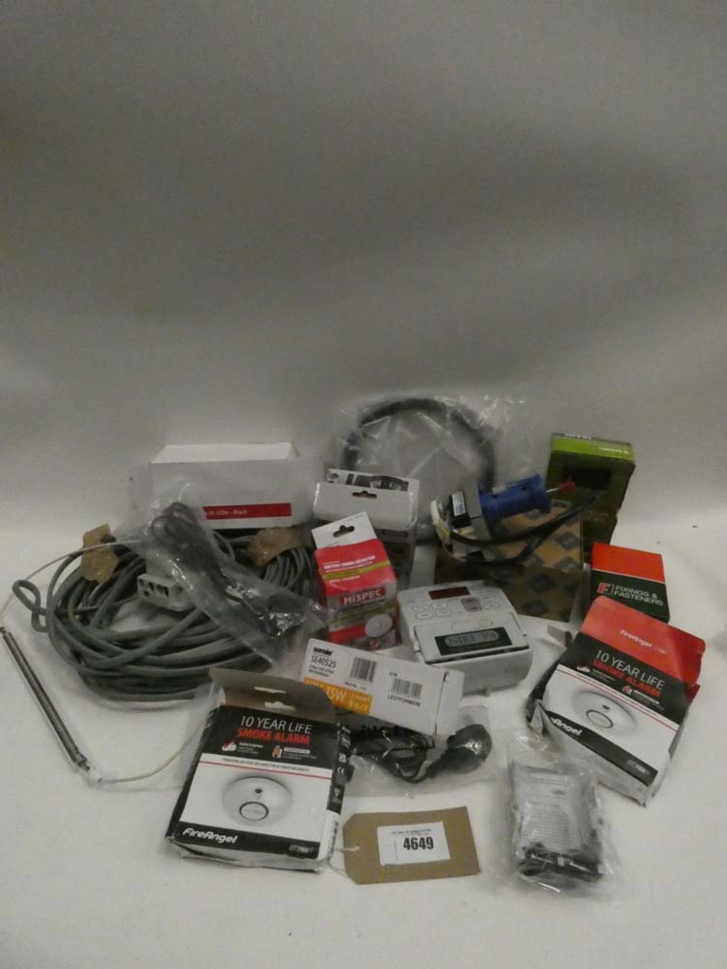 Bag containing electrical cables, smoke alarms, screws, small pump, dummy cameras, volumetric