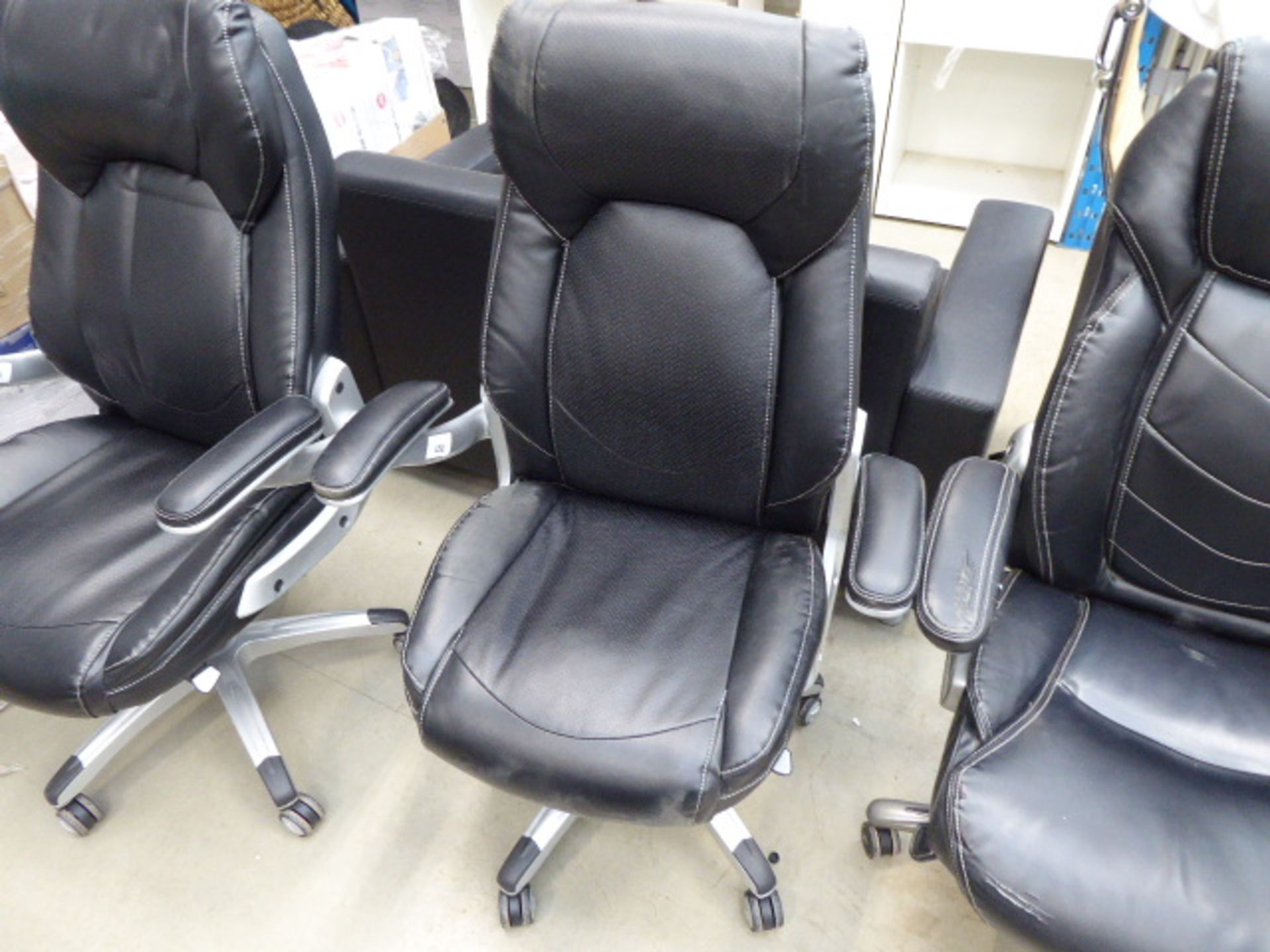 Black high-back executive swivel armchair