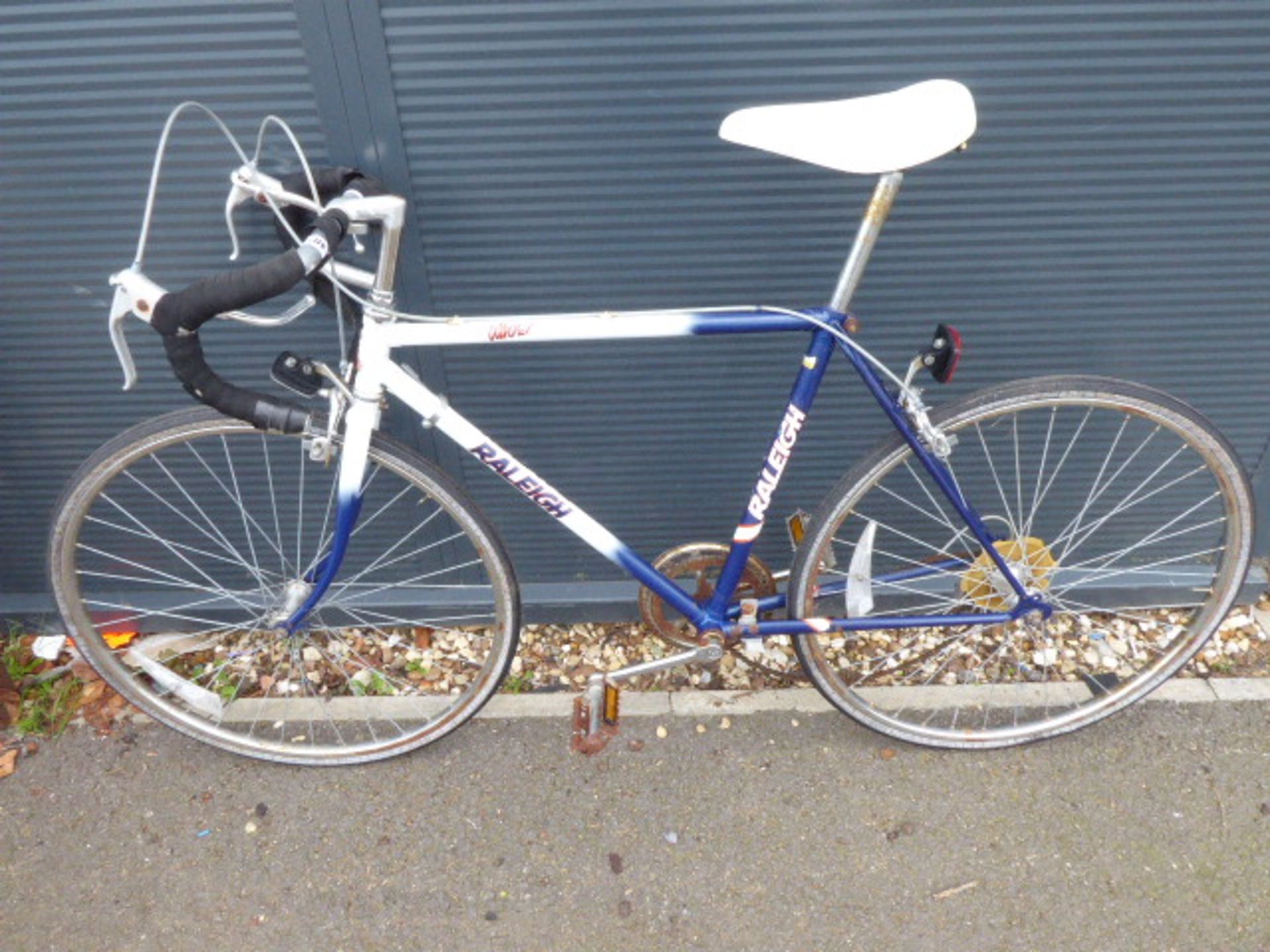 White and blue Raleigh racing bike