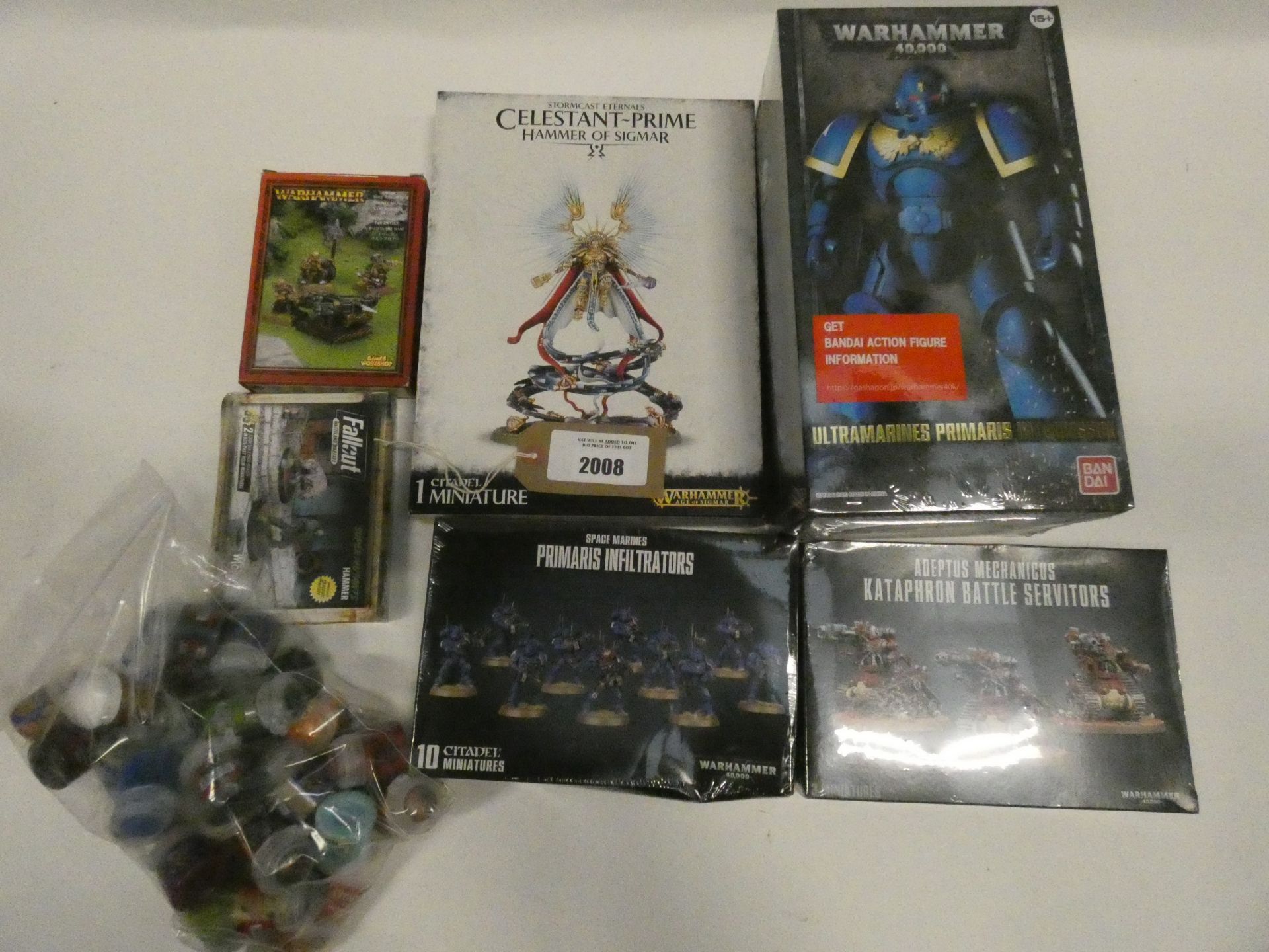 Bag contining boxed Warhammer paint pots and figures; Celestant-Prime, Ultramarines Primaris,