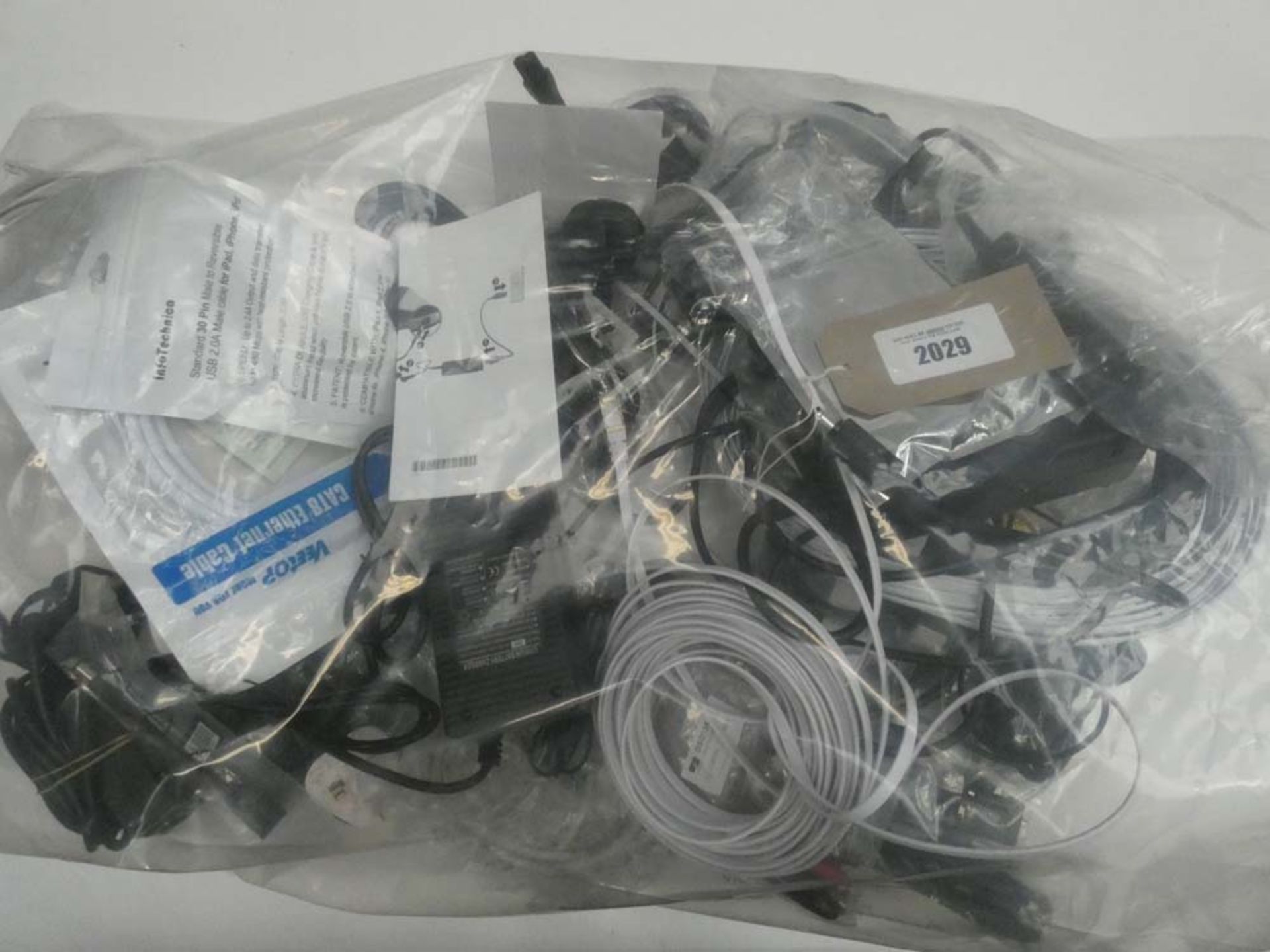 Bag containing various cables, leads and PSUs