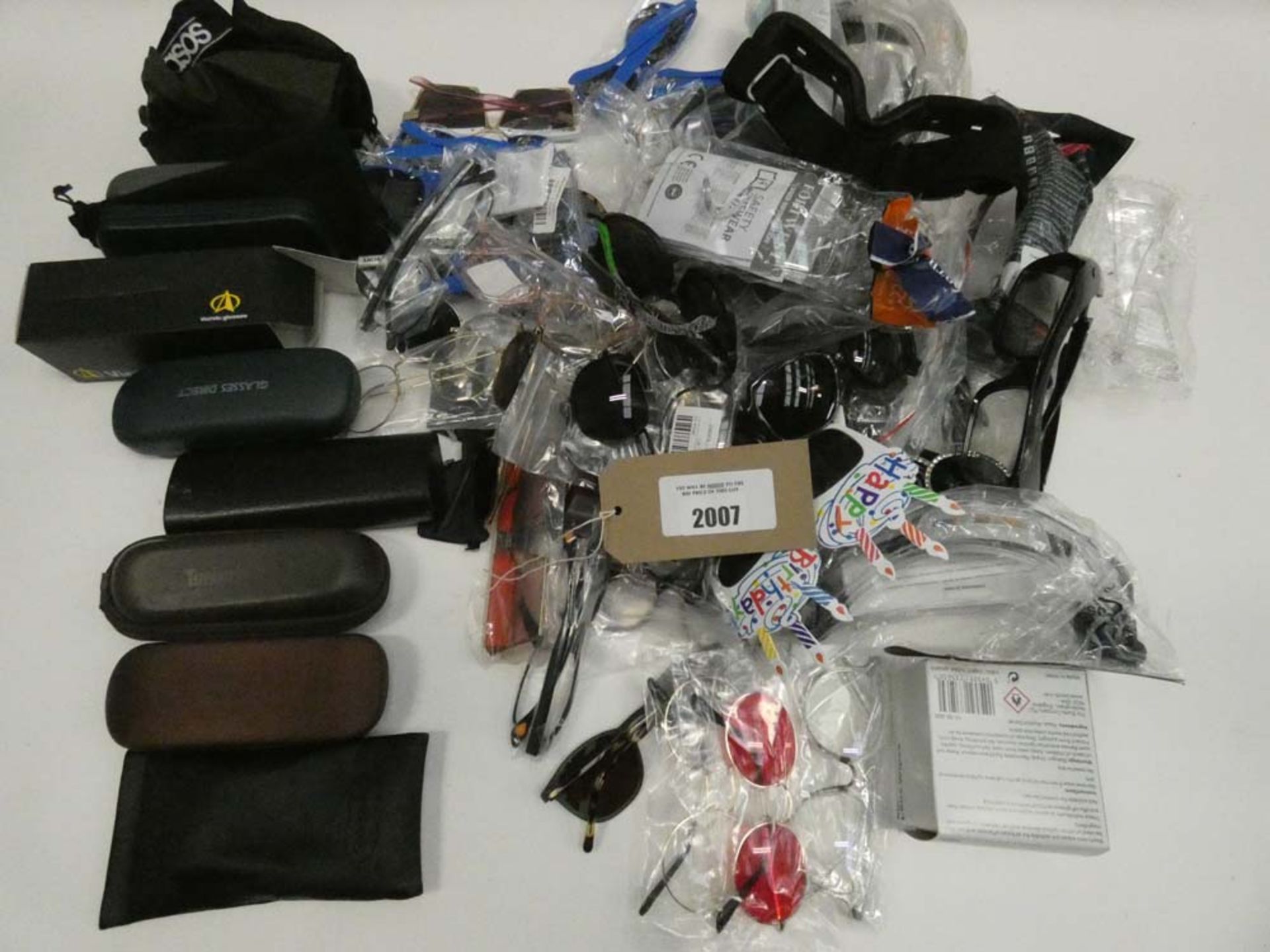 Bag containing various sunglasses, reading glasses and empty cases
