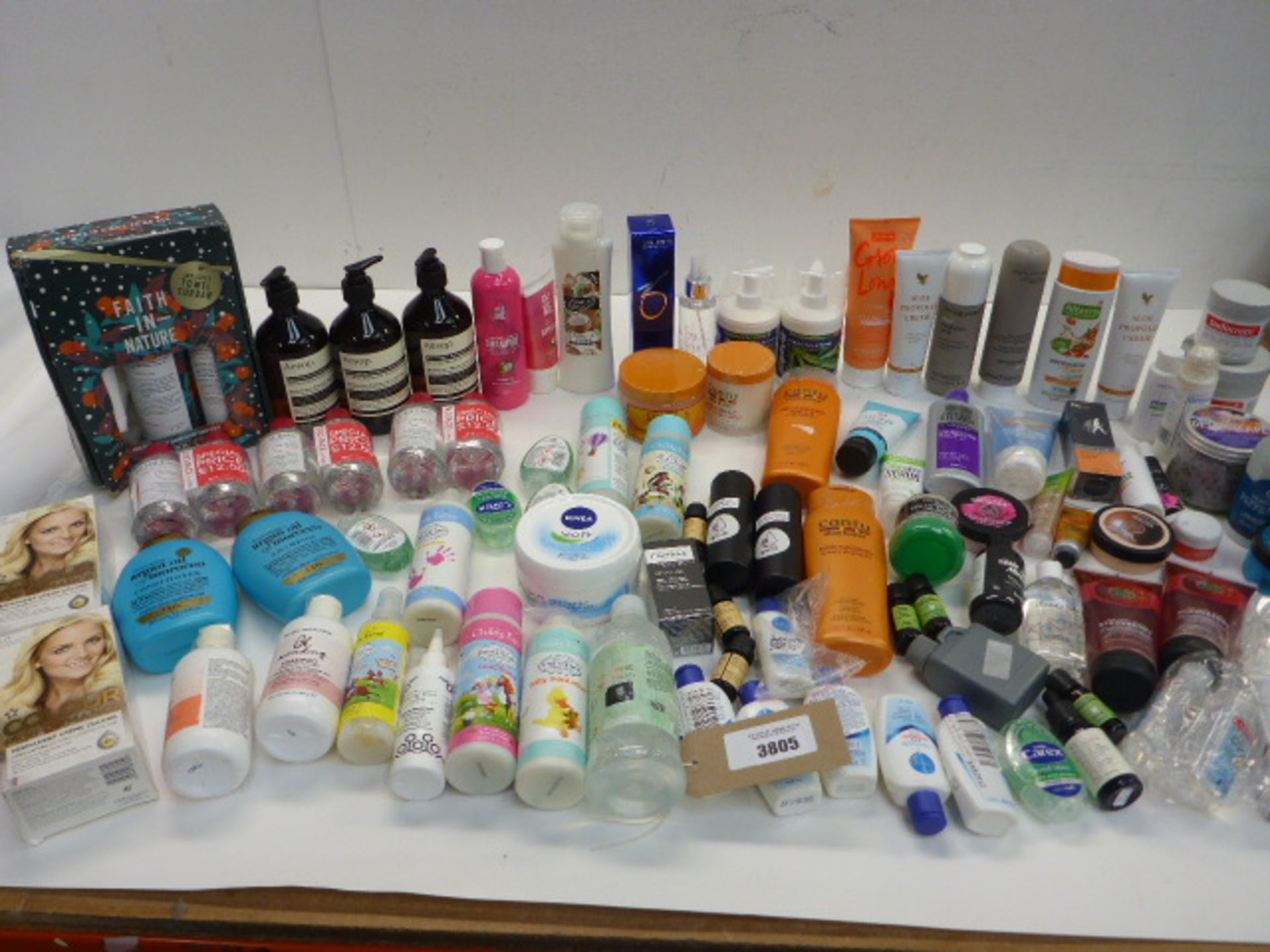 Large bag of toiletries including essential oils, hair colour, conditioner, shampoo, sanitizers,