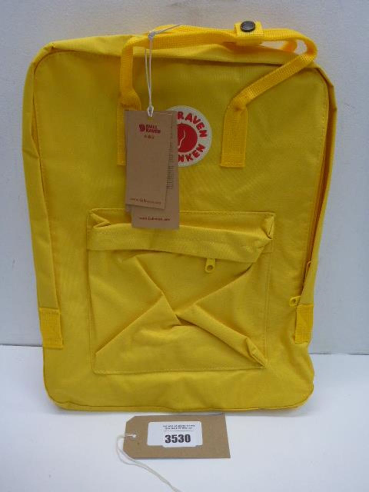 Fjallraven Kanken yellow backpack