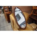 Mahogany framed oval wall mirror