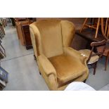 Georgian style upholstered wing armchair