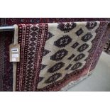 (26) Bokhara mat with ivory background