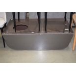 Grey glass coffee table with bowl