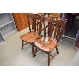 Pair of dark oak pub chairs