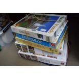 Stack of 6 jigsaw puzzles