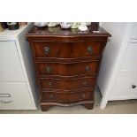 Reproduction mahogany serpentine fronted narrow chest of 4 drawers