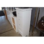 Cream painted narrow chest of 5 drawers