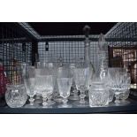 Cage containing a quantity of glassware to include a celery bowl, decanters and wine glasses