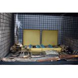 Cage containing loose cutlery and boxed cutlery sets