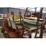 Edwardian salon suite comprising a pair of tub chairs and 4 side chairs in green upholstery