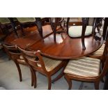 Reproduction mahogany extending dining table and 7 chairs