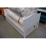 White painted child's bedstead with mattress