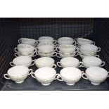 Cage containing a quantity of wedgewood floral patterned double handled bowls