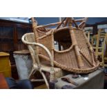 Pair of wicker and bent cane armchairs