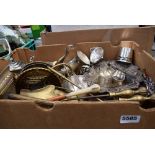 Box of silver plate and brass to include a fire companion set, jug, candlesticks, goblets and a part