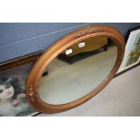 Oval gilt framed mirror