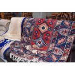 Woolen blue red and pink mat with geometric pattern