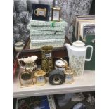 Box containing Royal Doulton Merry Christmas collectors plates plus Hornsea jug and clocks