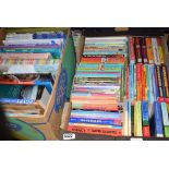 2 boxes containing children's books and reference books