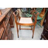 Victorian stool with carved supports and upholstered seats