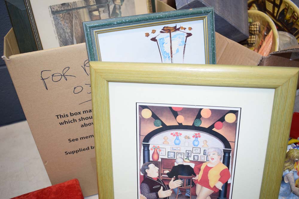 Box containing books and pictures to include country church and harbour