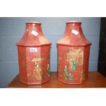 A pair of maroon painted Chinese tea canisters