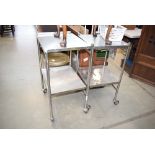 Two stainless steel trollies