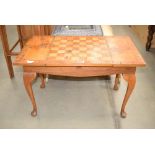 Coffee table with cabriole legs and chess board surface