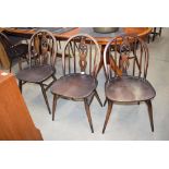 Six Ercol stickback dining chairs