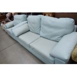 Mint green two seater leather effect sofa plus a matching armchair