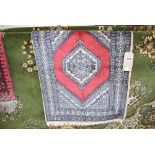 (23) Prayer mat with central medallion and red background