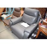 Grey leather effect electric reclining armchair