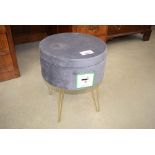 Circular grey fabric stool