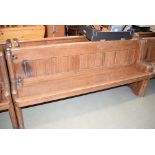 Pitched pine church pew