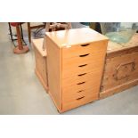 Narrow beech seven drawer storage unit