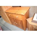 Pine sideboard with two drawers over two doors