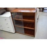 Oak effect three tier bookcase with glazed sliding doors