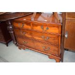 Reproduction yew chest of two over two drawers