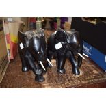 2 carved wooden elephants