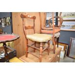 Three carved Victorian and upholstered dining chairs