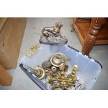 Box containing brass candlesticks, horse brasses, tongs and a figure of a dog