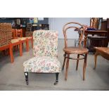 Thonet style cafe chair plus a floral patterned nursing chair