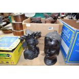 A box of carved African and Asian wooden figures