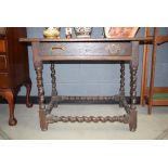 Georgian oak single drawer lowboy with barley twist supports