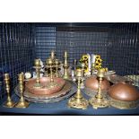 Cage containing book ends, brass candlesticks and copperware